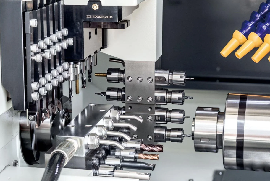 Swiss type CNC lathe machining a slender stainless pin